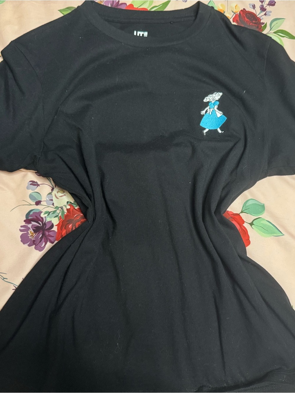 Uniqlo Black Short-Sleeve Tee with Blue Embroidered Girl Motif